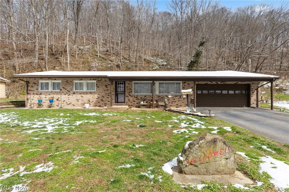 Brick ranch home with attached garage at 52736 Fisher Hill Rd, Clarington, Ohio
